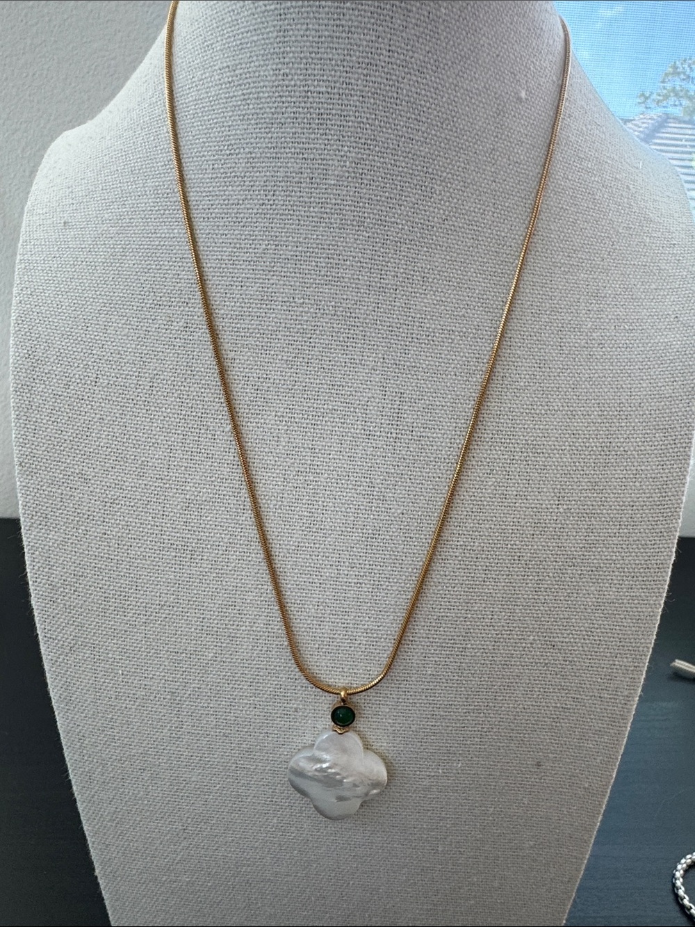 Gold Tone Necklace with White Mother-of-Pearl Pendant and Green Stone